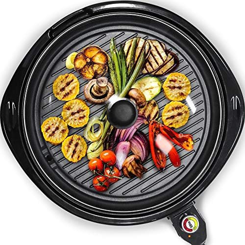 Round black electric grill with glass lid