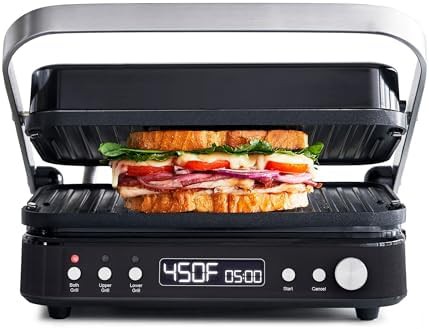 Black six in one grill with reversible plates